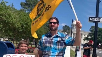 Barr threatens legal action for states with strict coronavirus restrictions