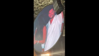 Soccer great Lionel Messi seen on Coldplay kisscam