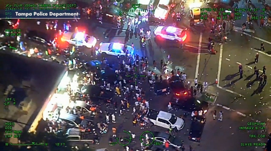 Crowd surrounds cops responding to reports of shots fired in Tampa