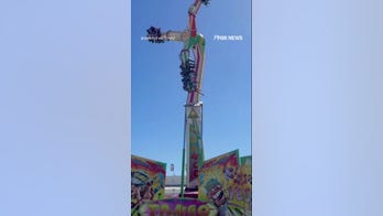 WATCH: People STUCK in mid-air after Houston rodeo ride malfunction 