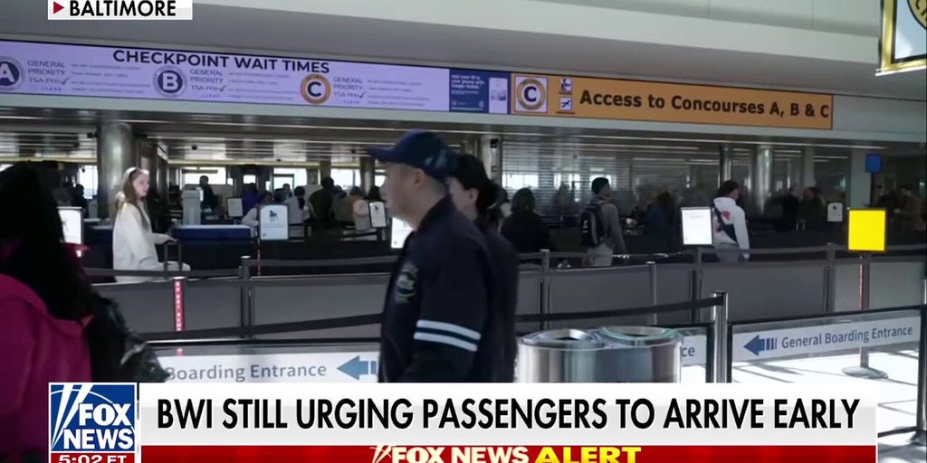 Trump signs executive order to pay TSA agents as shutdown hits record length