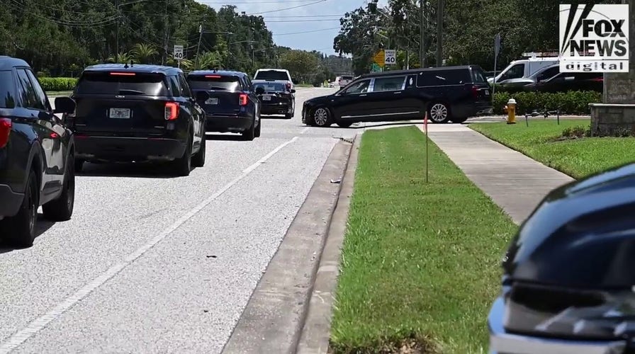 Hulk Hogan's hearse leaves the Indian Rocks Church