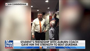 Young cancer patient receives support from Auburn coach, now he joins the staff cancer-free