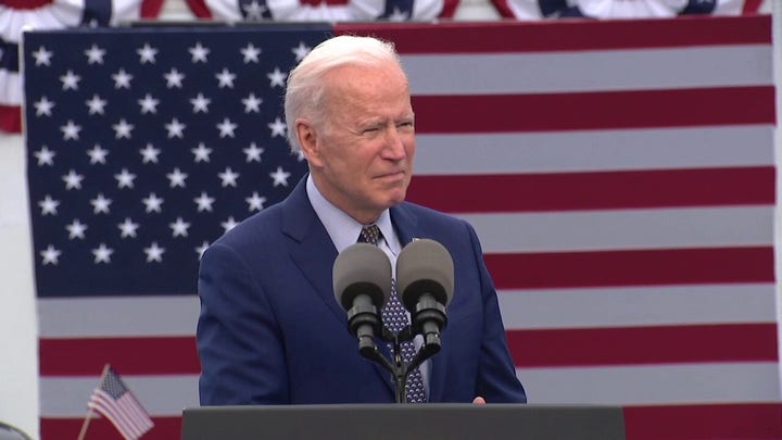 Biden heckled during Georgia 'drive-in' address