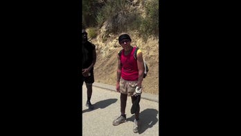 Californians confront man accused of starting fire in Los Angeles