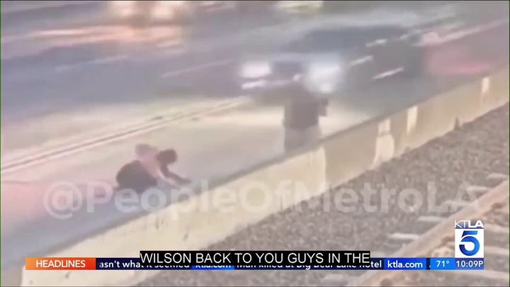 Disturbing video shows man trying to throw woman into LA traffic