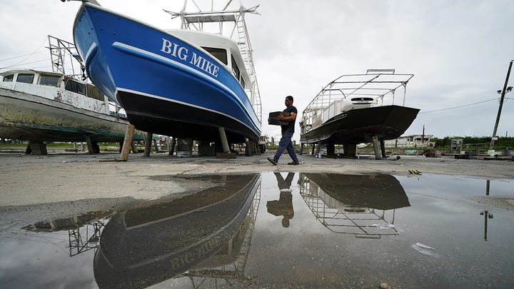 Gulf Coast braces for tropical storms Marco and Laura