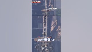 Masked man proposes to woman on Empire State Building spire