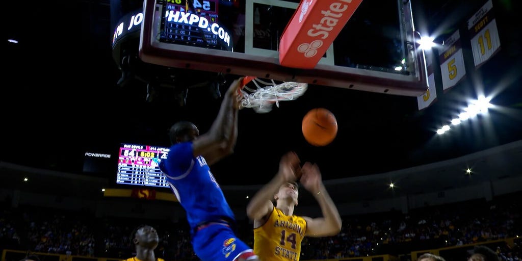 Kansas' Darryn Peterson drives and dishes to Flory Bidunga for slam vs. Arizona State