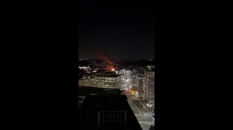 Fire seen after Virginia home explodes during a police search