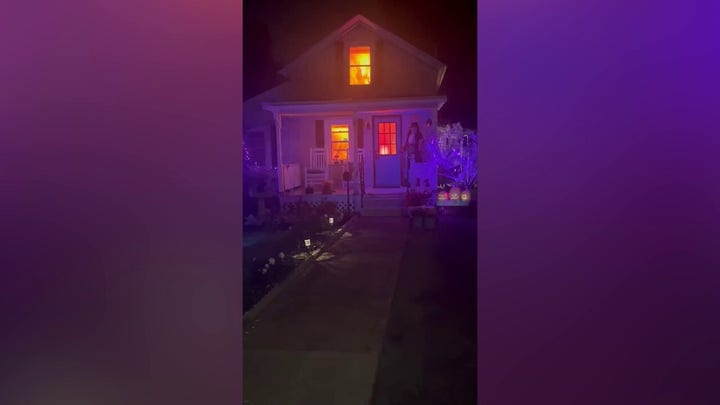 New York firefighters called to house 'fire' that was actually an impressive Halloween display.