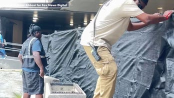 Crews add more privacy screening outside Madison Square Garden