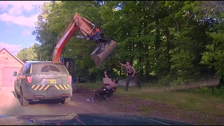 Man allegedly swings excavator at Vermont state troopers who were trying to arrest his son