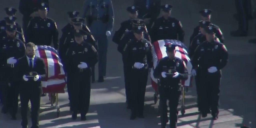 Slain Bristol, Connecticut police officers remembered in joint funeral