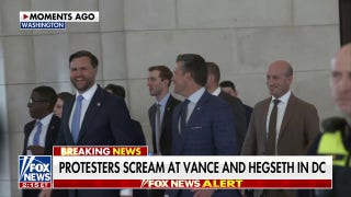 Vance and Hegseth heckled by protestors in visit to DC National Guard