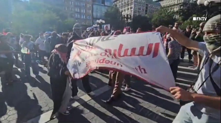 Anti-Israel supporters march in New York City with 'Long Live Oct 7th' banner