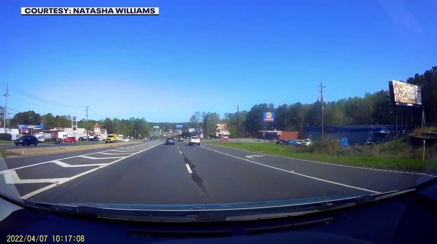 Dashcam video captures small plane crashing on Georgia highway