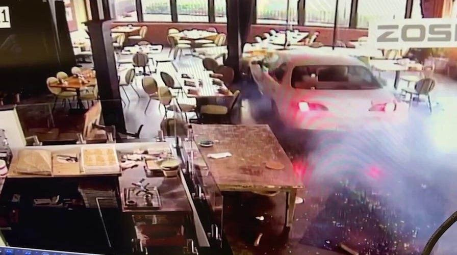 Car drives through Georgia restaurant's windows, sending customers running