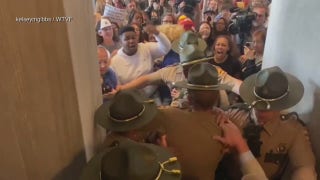 State Troopers push back crowd of protestors storming the Tennessee State Capitol - Fox News