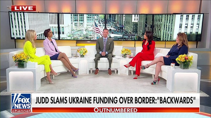 'Priority crisis': Lawmakers under fire for waving Ukraine flags 