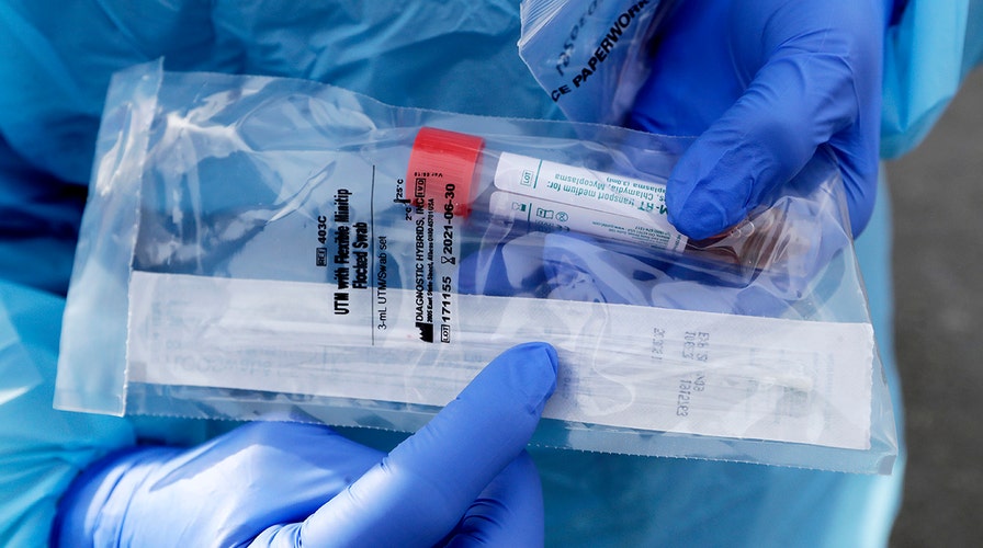 Officials warn US coronavirus cases will spike as test kits become more widely available