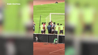Soccer gets run over by lawn roller while warming up for match