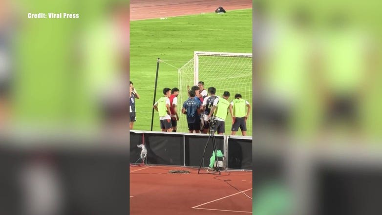 Soccer gets run over by lawn roller while warming up for match
