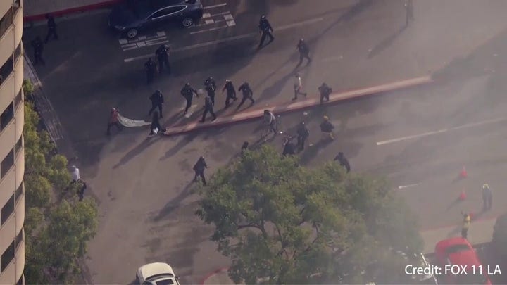 Pro-Palestine protesters block traffic near LAX entrance