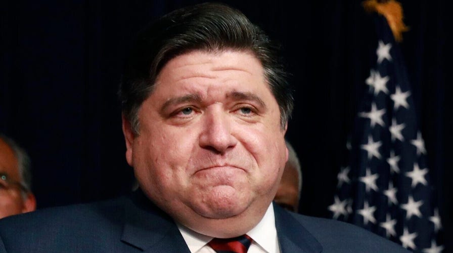 Illinois governor says new COVID-19 numbers should show state could be nearing peak