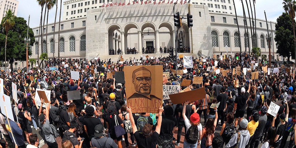 Thousands protest peacefully in Los Angeles as city council crafts