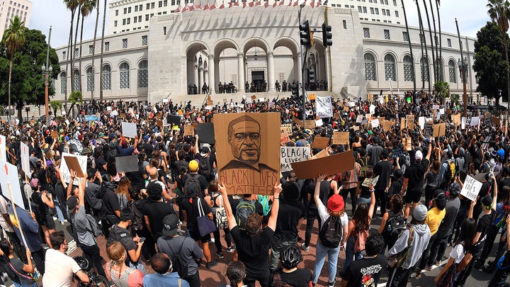 Thousands protest peacefully in Los Angeles as city council crafts police reform agenda