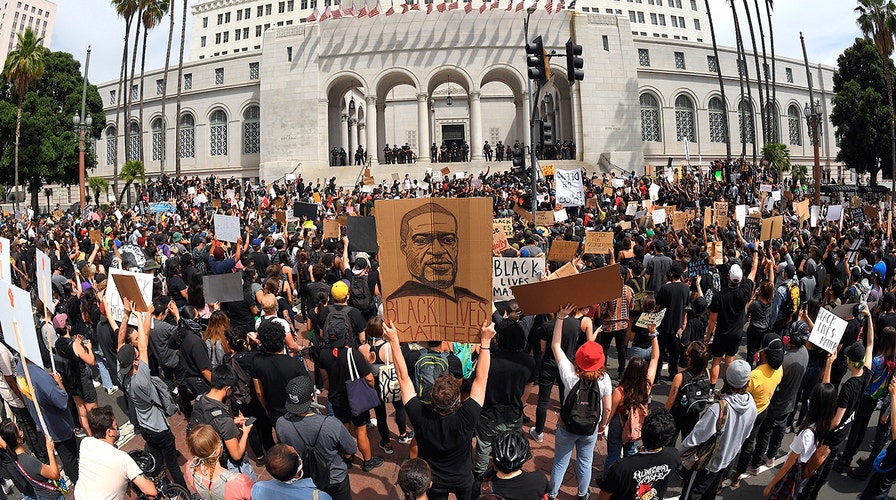 Thousands protest peacefully in Los Angeles as city council crafts police reform agenda