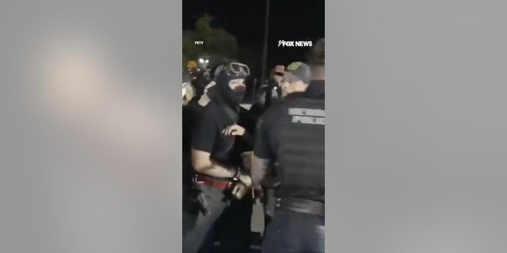 Protesters CLASH with police outside ICE facility