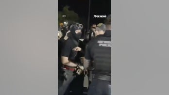 Protesters CLASH with police outside ICE facility