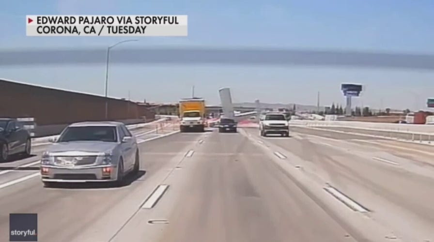 A small plane crash lands on a highway in Corona, California near Los Angeles