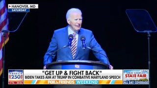 Biden gets heckled, takes aim at Trump during combative Maryland speech