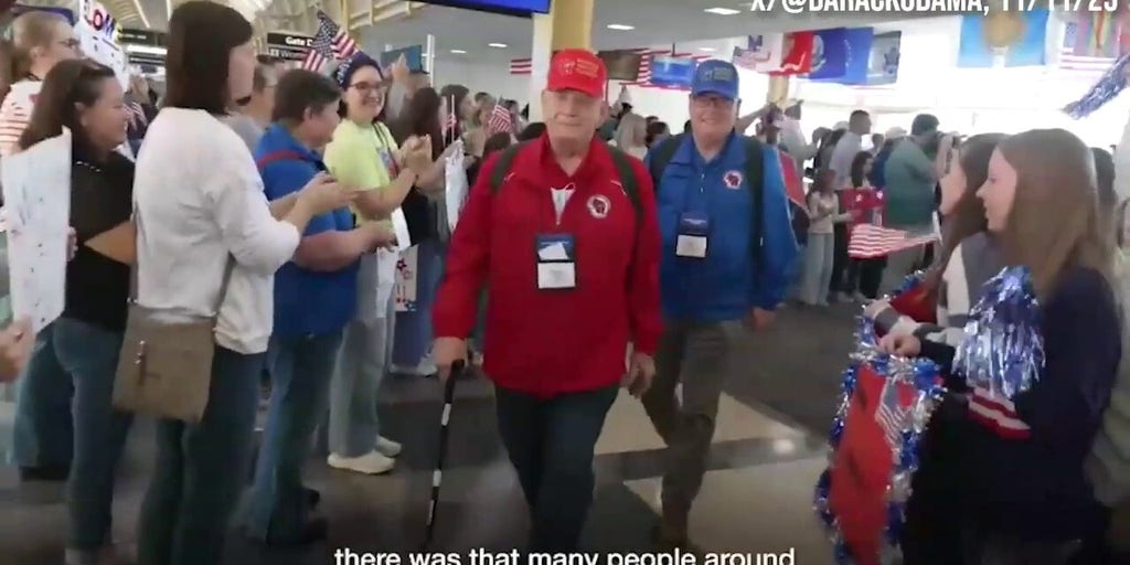 Former President Barack Obama surprises veterans aboard Honor Flight to Washington, DC