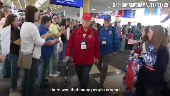 Former President Barack Obama surprises veterans aboard Honor Flight to Washington, DC