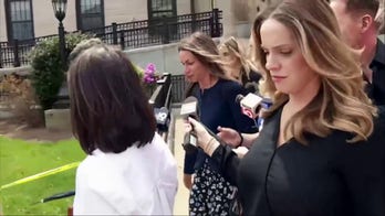 Karen Read speaks to reporters following the first week of her second trial 