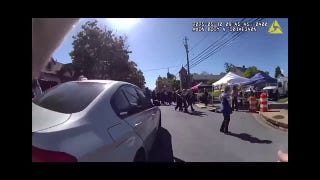 Woman arrested after barreling into crowd at festival