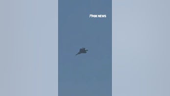 F-22 Raptor flyovers impress despite extreme heat
