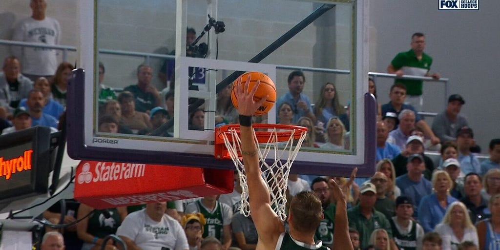 Michigan State's Carson Cooper hammers home alley-oop slam vs. North Carolina