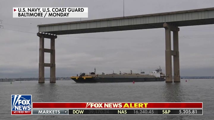 U.S. Coast Guard, military working to reopen port of Baltimore