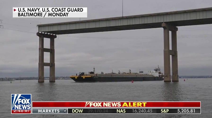 US Coast Guard, military working to reopen port of Baltimore