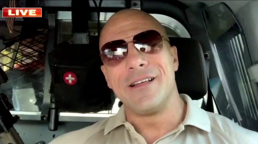 Police officer reacts to going viral as Dwayne 'The Rock' Johnson lookalike