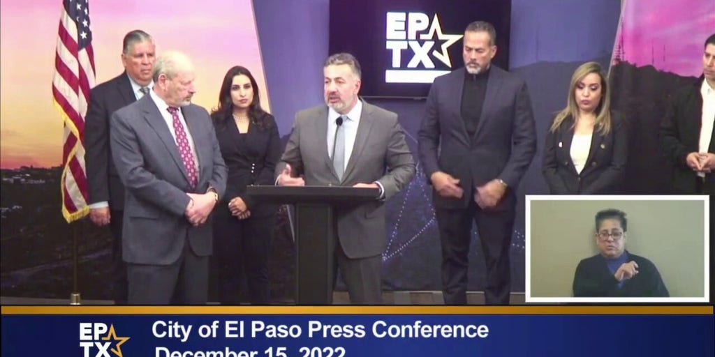 El Paso, Texas mayor Oscar Leeser wraps up press conference and picks up microphone to leave