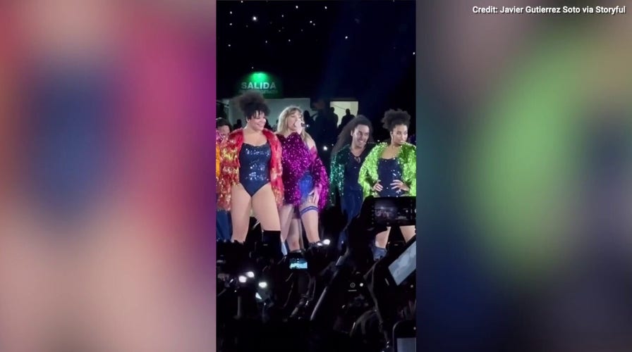 Taylor Swift laughs as she changes the lyrics to her song 'Karma' to reference Travis Kelce