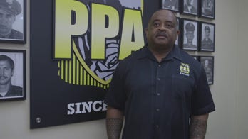 As cops call for body cams, Portland cuts police budget again