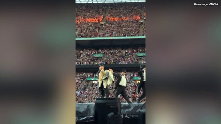 Travis Kelce joins Taylor Swift on stage during 'Eras Tour' in London
