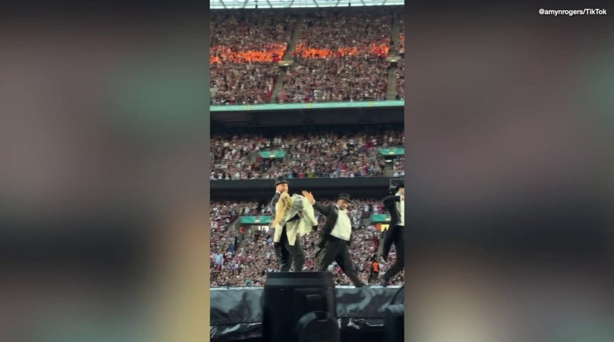 Travis Kelce joins Taylor Swift on stage during 'Eras Tour' in London
